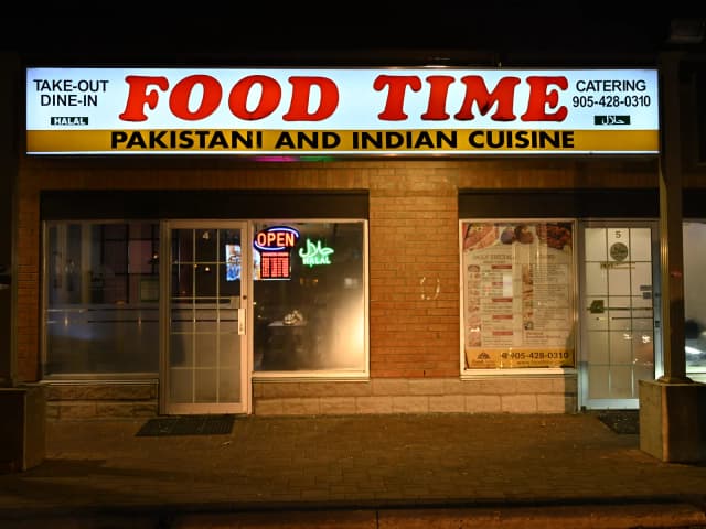 Food Time Pickering storefront — red & white signage